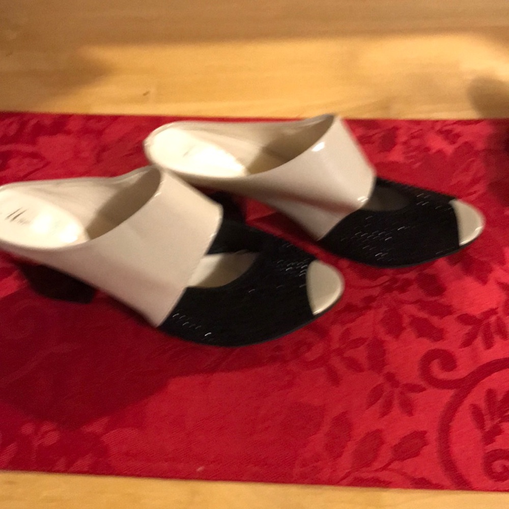 White patent leather and black sequin heels